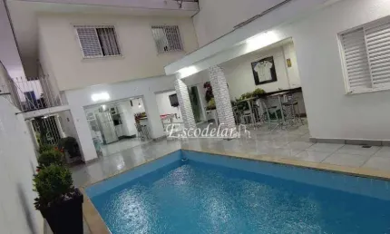 Sobrado com piscina, área gourmet, 3 dormitórios sendo 1 suíte e 4 vagas à venda, 210 m² por R$ 1.150.000 - Imirim - São Paulo/SP