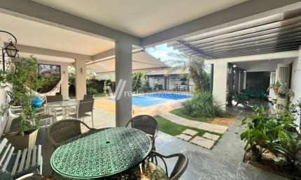 Casa em condomínio fechado com 4 quartos para alugar na Rua Dona Elza Pompeu de Camargo, 57, Jardim das Paineiras, Campinas, 436 m2 por R$ 10.500
