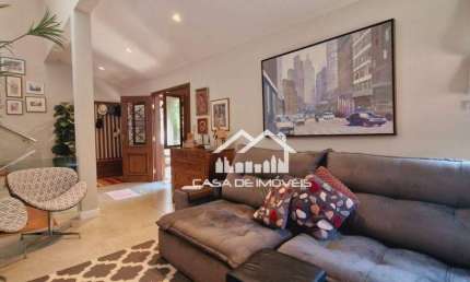 Vende casa em condomínio fechado de 350m² à vvenda na Granja Vianna II.