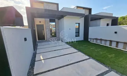 Casa nova com 03 dormitórios e acabamentos de alto padrão em Itapoá/SC