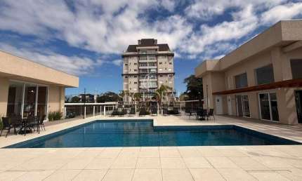 Apartamento no 1° andar do Residencial Ocean Castle, frente para mar em Itapoá-SC
