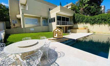 Casa com 3 dormitórios, 420 m² - venda por R$ 2.400.000,00 ou aluguel por R$ 16.000,00/mês - Condomínio Arco Iris - Atibaia/SP