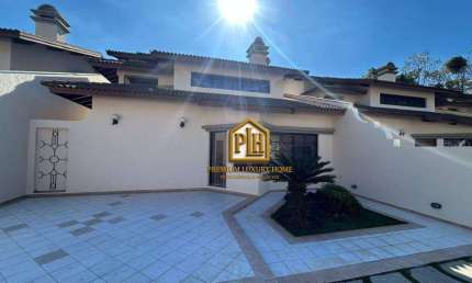 Casa com 3 dormitórios para alugar, 190 m² por R$ 6.580,00/mês - Vila Santista - Atibaia/SP