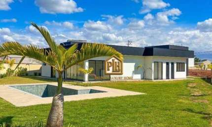 CASA TÉRREA COM 4 SUITES À VENDA NO CONDOMÍNIO SHAMBALA III EM ATIBAIA