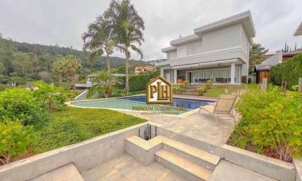 Casa à venda no Condomínio Porto Atibaia – 4 dormitórios, vista para o lago, área gourmet e piscina!