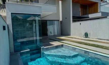 Casa moderna de 350M² com design contemporâneo no condomínio Green Place.