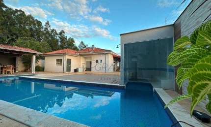 Casa com 3 suítes à venda, 400 m² por R$ 1.200.000 - Lagamar - Varginha/MG