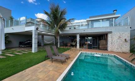 Casa com 4 suítes e piscina à venda, 380 m² por R$ 1.900.000,00 - Riviera do Lago - Varginha/MG