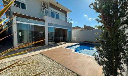 Casa com 3 suítes à venda, 300 m² por R$ 1.950.000 - Pinheiros - Varginha/MG