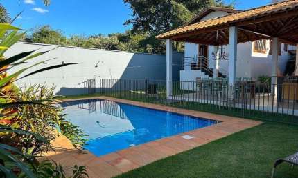 Casa com 3 suítes à venda por R$ 2.300.000 - Condomínio Lagamar - Varginha/MG