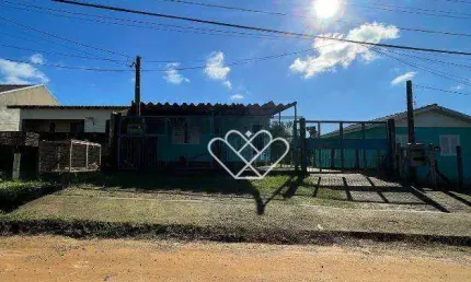 Casa Aconchegante com 3 Dormitórios e Amplo Terreno no Bairro Padre Réus, Gravataí