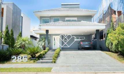 Casa alto padrão com 4 quartos à venda e locação no condomínio Alphaville em Gravataí