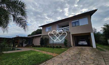 Casa Ampla com Piscina, Salão de Festas e 4 Dormitórios em Neópolis – Conforto e Lazer em Gravataí