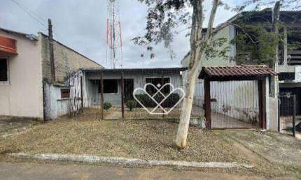 Casa Espaçosa com Quintal no Bairro Vera Cruz – 2 Dormitórios e 3 Vagas Cobertas