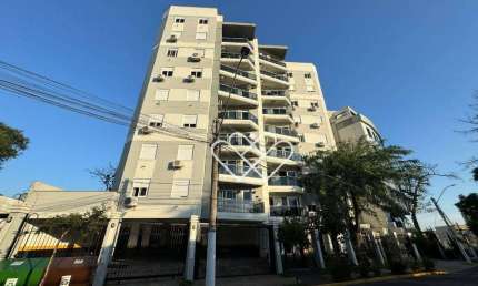 Apartamento sofisticado no Centro com sacada, móveis planejados e infraestrutura moderna