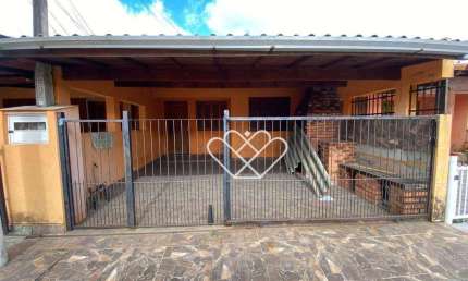 Seu Novo Lar: Charmosa Casa com Quintal e Churrasqueira no Bairro Santa Cruz