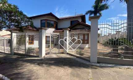 Elegância e Conforto: Casa com Piscina e Churrasqueira no Centro de Gravataí!