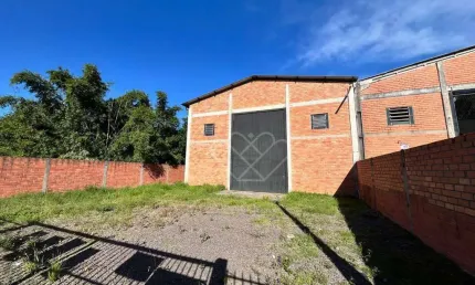 Pavilhão comercial à venda ou para locação com amplo terreno em Gravataí