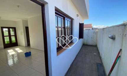 Descubra o conforto e a praticidade desta casa para alugar no bairro Vila Carlos Antônio Wilkens, em Cachoeirinha.