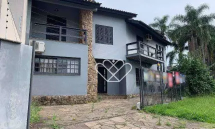 Residência à venda ou locação no bairro Dom Feliciano — espaço, conforto e localização central em Gravataí