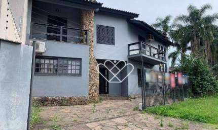 Residência à venda ou locação no bairro Dom Feliciano — espaço, conforto e localização central em Gravataí