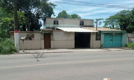 Lote comercial com casa em Itaipuaçu na Avenida Carlos Mariguella.