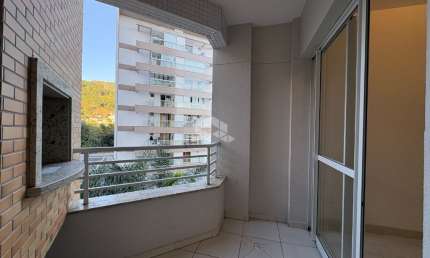 APARTAMENTO COM 2 QUARTOS SENDO 1 SUÍTE COM SACADA E CHURRASQUEIRA NO ITACORUBI EM CONDOMÍNIO COMPLETO
