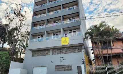 Apto de um quarto e sala com varanda e garagem no Aeroporto