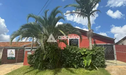 Casa com kitinetes e amplo terreno à venda, localizada no bairro Chapada