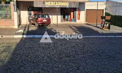 Sobrado à venda em Uvaranas,  contendo comercial no térreo e residencial na parte superior, Ponta G