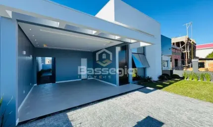 'Casa Térrea Alto Padrão no Centro de Tramandaí com 3 Suítes, Piscina e Automação Alexa!'