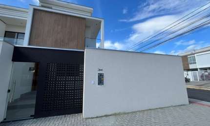 Casa com 3 quartos à venda na Budapeste, 133, Santa Regina, Camboriú, 103 m2 por R$ 732.000