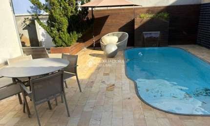 Casa em condomínio fechado com 3 quartos à venda na Avenida das Arapongas, 455, Ariribá, Balneário Camboriú, 248 m2 por R$ 2.690.000