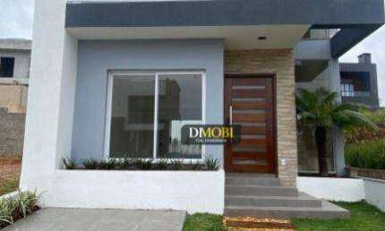Sobrado com 3 dormitórios à venda, 147 m² por R$ 850.000,00 - Condomínio Primavera - Gravataí/RS