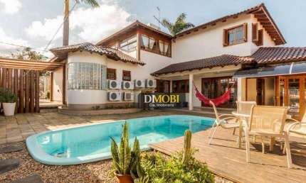 Sobrado com 4 dormitórios para alugar, 427 m² por R$ 15.920,00/mês - Centro - Gravataí/RS