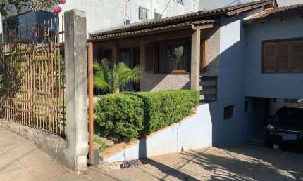Casa com 3 dormitórios para alugar, 350 m² por R$ 8.245,00/mês - Centro - Gravataí/RS