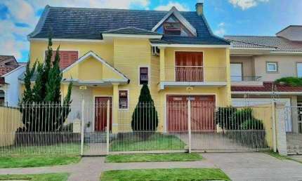 Sobrado com 4 dormitórios para alugar, 360 m² por R$ 7.250/mês - Dom Feliciano - Gravataí/RS