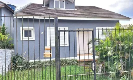 Casa com 3 dormitórios para alugar, 180 m² por R$ 3.455,00/mês - Natal - Gravataí/RS