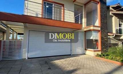 Sobrado com 4 dormitórios para alugar, 180 m² por R$ 7.230,00/mês - Villa Lucchesi - Gravataí/RS