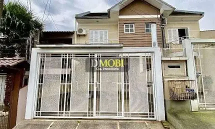 Sobrado com 4 dormitórios à venda, 170 m² por R$ 399.000,00 - Bela Vista - Gravataí/RS