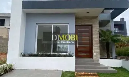 Sobrado com 3 dormitórios à venda, 147 m² por R$ 850.000,00 - Condomínio Primavera - Gravataí/RS
