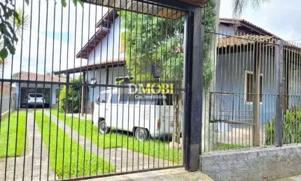Casa com 4 dormitórios à venda, 296 m² por R$ 870.000,00 - Natal - Gravataí/RS