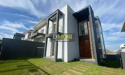 Sobrado com 4 dormitórios à venda, 172 m² por R$ 849.900,00 - Condomínio Reserva do Arvoredo - Grav