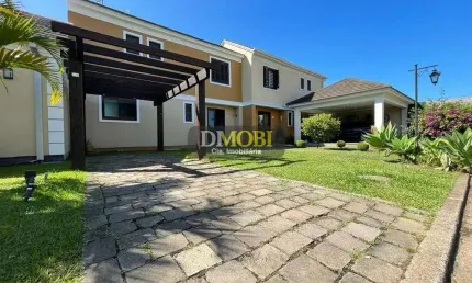 Sobrado com 3 dormitórios para alugar, 107 m² por R$ 4.691,00/mês - Reserva do Arvoredo - Gravataí/