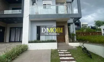 Sobrado com 3 dormitórios para alugar, 152 m² por R$ 7.997,00/mês - Primavera - Gravataí/RS