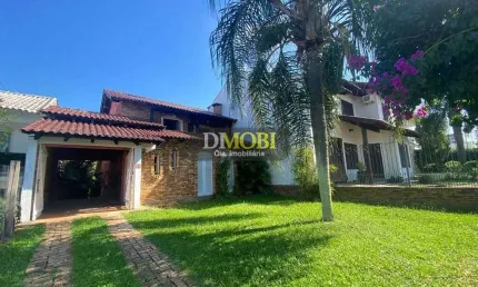 Sobrado com 3 dormitórios para alugar, 220 m² por R$ 6.753,00/mês - Centro - Gravataí/RS