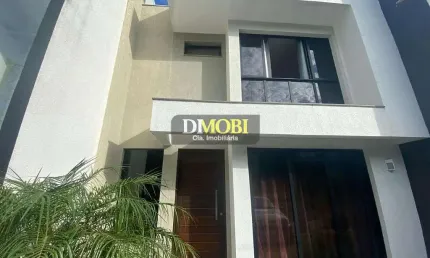 Sobrado com 3 dormitórios para alugar, 112 m² por R$ 6.735,00/mês - Primavera - Gravataí/RS