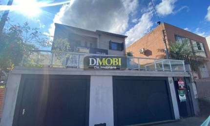 Sobrado com 4 dormitórios para alugar, 190 m² por R$ 5.460,00/mês - Oriço - Gravataí/RS