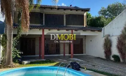 Sobrado com 3 dormitórios para alugar, 250 m² por R$ 6.750,00/mês - Dom Feliciano - Gravataí/RS