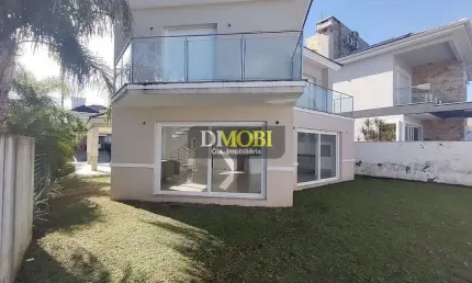 Sobrado com 3 dormitórios para alugar, 220 m² por R$ 8.900,00/mês - Alphaville - Gravataí/RS